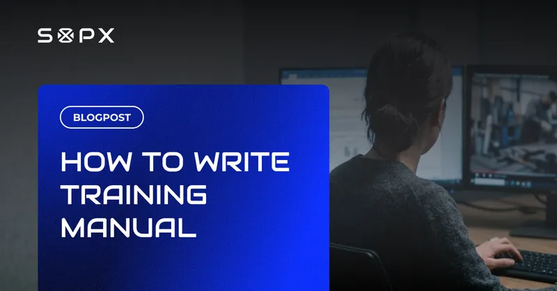 Woman at a computer writing a training manual at her desk.